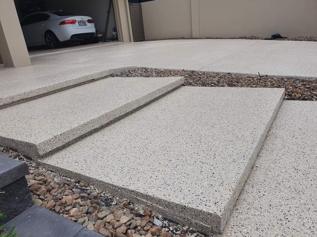 Cream flake driveway and front steps coated at a Los Angeles home