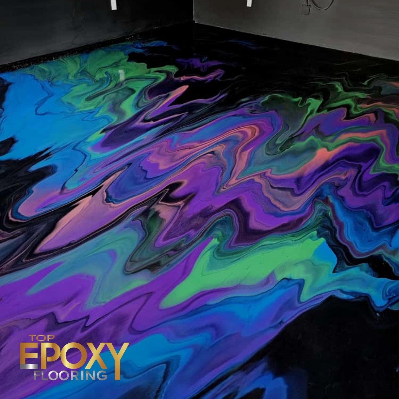 custom color metallic epoxy floor in garage