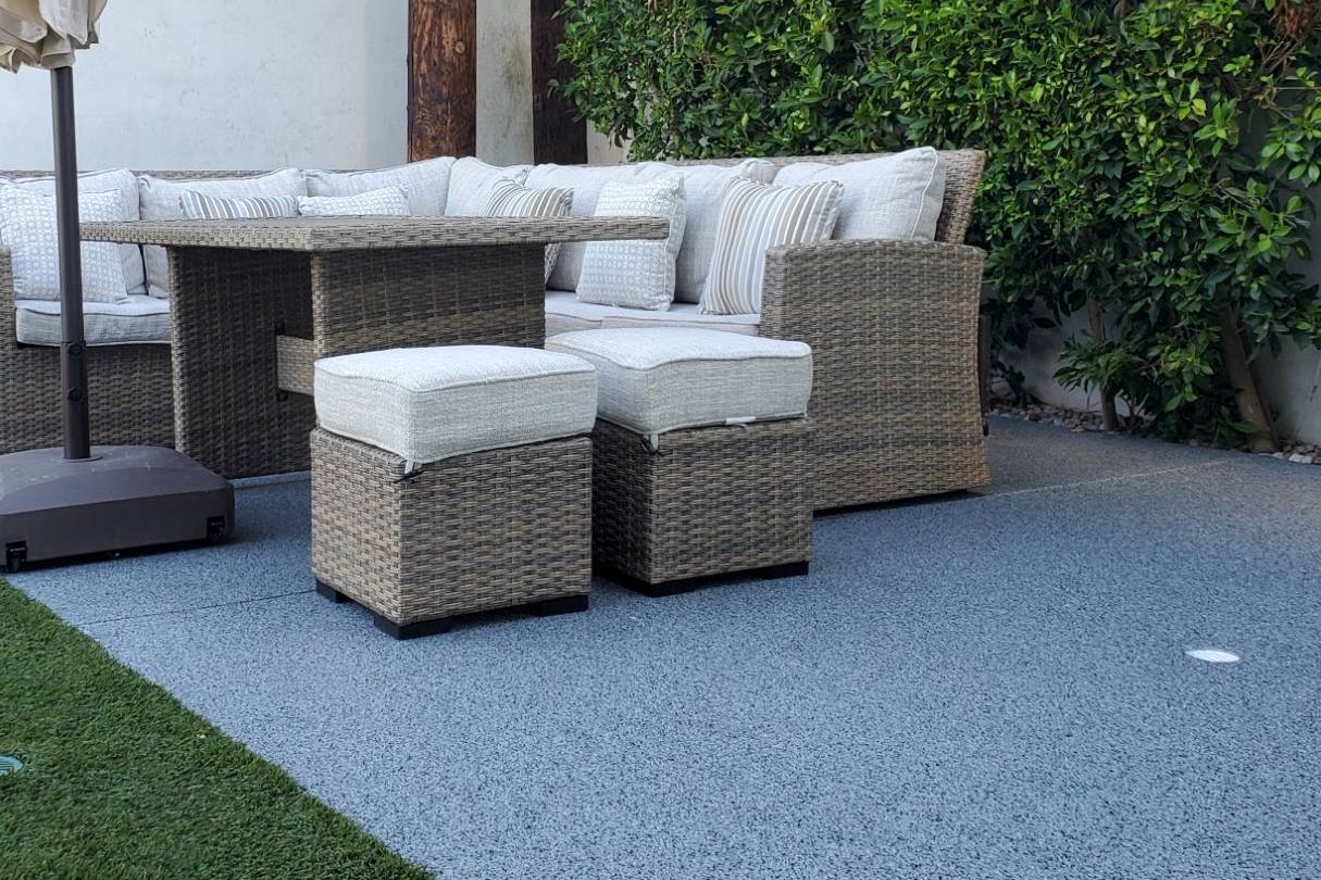 Blue-gray flake patio floor with outdoor furniture at a Los Angeles home