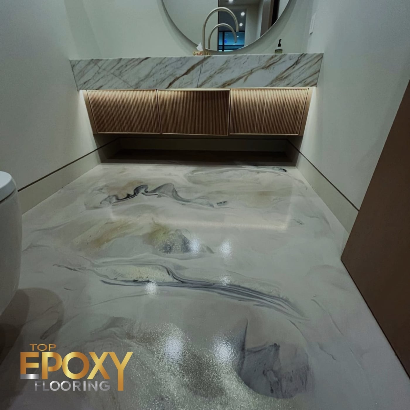 glitter gold metallic epoxy floor in bathroom