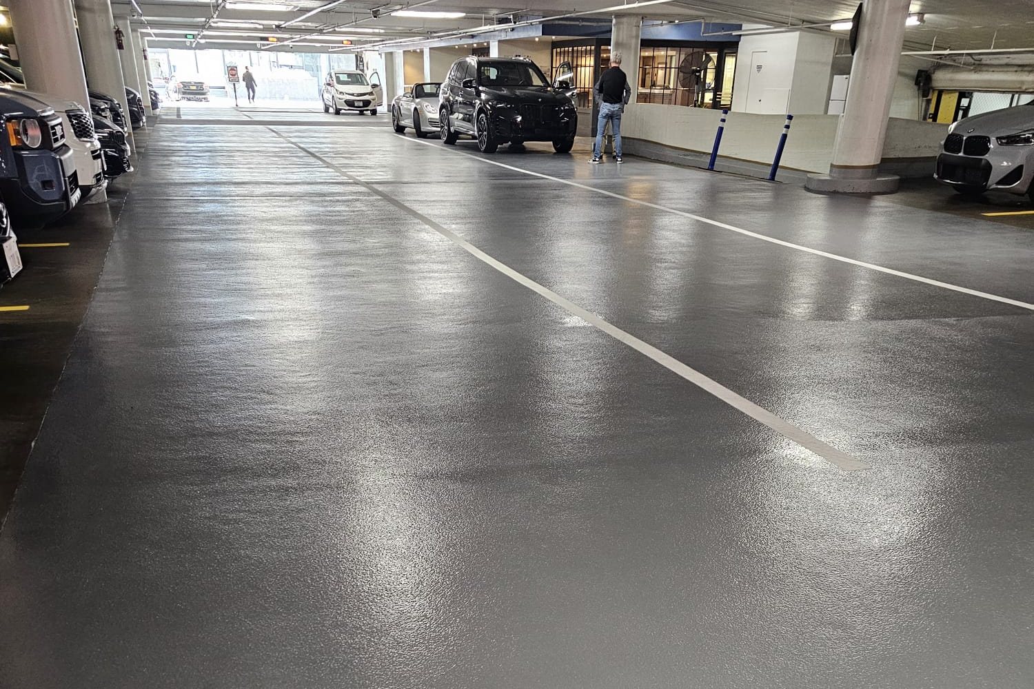 Sand finish coating across a Los Angeles parking garage