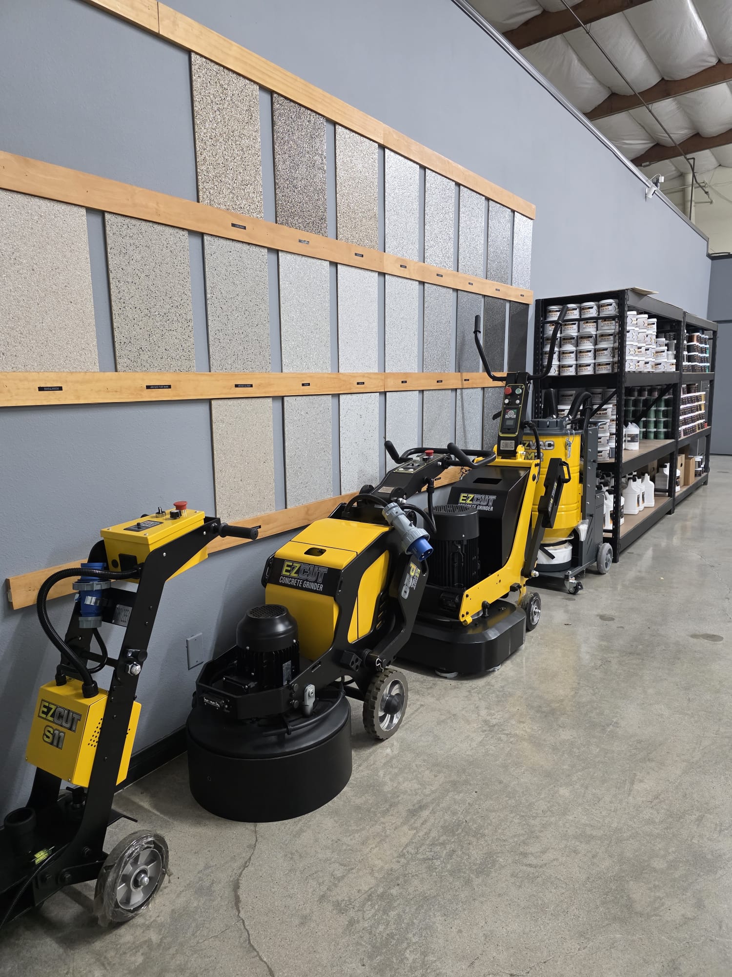 Showroom flake sample wall and floor grinders in our Los Angeles warehouse
